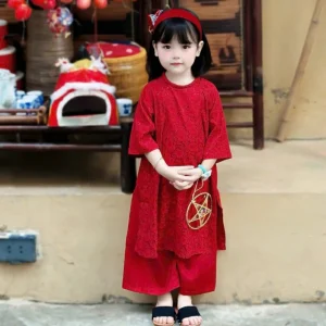 Áo dài gấm hoa bé gái